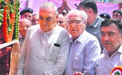 Haryana Chief Minister Bhupinder Singh Hooda lays the foundation stone of Punjabi Bhawan in Sector 15, Panchkula, on Tuesday. Tribune Photo: Nitin Mittal