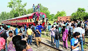 Annoyed over the less number of coaches and long stoppage of the DMU train at Khojewal village, the passengers stopped the train on Tuesday