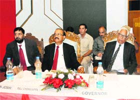 (From right) Governor NN Vohra, Editor-in-Chief of The Tribune group of newspapers Raj Chengappa and Resident Editor, J&K Edition, Arun Joshi, at a function of The Tribune Inter-College Debate Contest in Srinagar on Monday