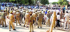 Police personnel deployed outside the SDMs office in Sriganganagar on Tuesday