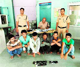 Haridwar police with the arrested thieves at Ranpur police station on Tuesday.