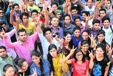 Students in a jubilant mood after the announcement of the date for the Panjab University Campus Students Council elections, at the Student Centre on Wednesday