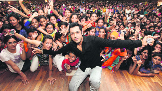 Actor Gippy Grewal with students of the SGGS College for Women during a function organised to promote his film on the campus in Sector 26, Chandigarh, on Wednesday.