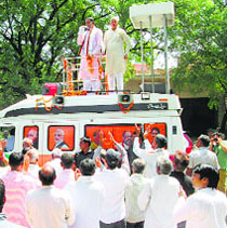 State BJP chief Ram Bilas Sharma addresses a gathering during the Vijay Sankalp Yatra in Rewari on Wednesday.