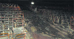 The burnt section of Bahagwat Geeta Sadan University auditorium at the Kurukshetra University.