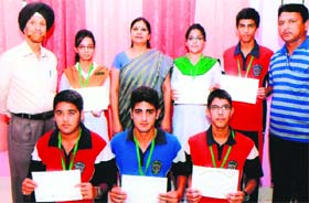 Students of Delhi Public School, Jammu, who won medals in the district-level inter-school tournament