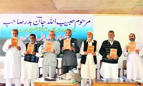 Habibullah Jan's collection of Kashmiri poems 'Khayal-e-Momin' being released at a function at Bijbehara town in Anantnag on Wednesday