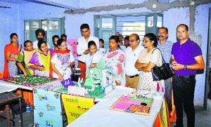 Officials of the Education Department have a look at the models during the district-level Inspire Award Exhibition in Ludhiana. 