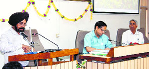 Officials speak during the annual group meet of All India Coordinated Research Project on Forage Crops at Punjab Agricultural University in Ludhiana on Wednesday