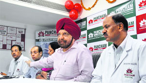 RP Singh, managing director and chief cardiologist of Pancham Multi Super Speciality Hospital, addresses the media in Ludhiana.