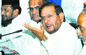 Janata Dal (U) chief Sharad Yadav addresses a press conference in New Delhi on Wednesday