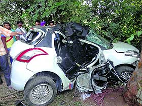The mangled remains of the car near Morinda on Wednesday.