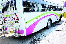 A private bus with broken windows in front of Akal Degree College at Mastuana Sahib on Wednesday.