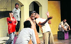 Artistes perfom a comedy play, Jinhe Jhalle Mere Palle, during a four-day theatre festival at Punjab Natshala in Amritsar on Thursday