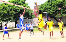 Players in action during a match of the Inter-School Volleyball Championship at Government Model Senior Secondary School, Sector 26, Chandigarh, on Thursday