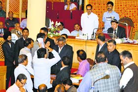 NC members raise a point in the Legislative Council. Amin War