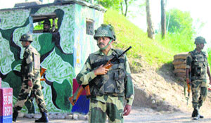 BSF personnel keep vigil along the the international border in the Akhnoor subdivision.
