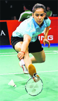Saina Nehwal returns a shot during her match against Japans Sayaka Takahashi at the World Badminton Championships at Ballerup Arena in Denmark on Thursday
