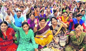 Teachers protest outside the Education Directorate in Dehradun on Thursday.