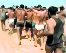 An image grab taken from a video uploaded on social networks on Thursday shows young men in underwear being marched along a desert road before being allegedly executed by Islamic State militants at an undisclosed location in Syrias Raqa Province