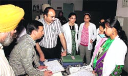 Deputy Commissioner Ravi Bhagat inspects a government health institution in Amritsar on Friday. a Tribune photograph