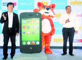 Low-Cost Smartphone: Spice Mobility CEO Prashant Bindal (R) and senior director, Mozilla Corp., James Ho at the launch of Spice Fire One Mi-FX1 smartphone in New Delhi on Friday. It is priced at Rs 2,229.