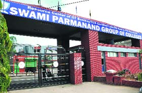 The entrance gate of Swami Parmanand Group of Colleges at Lalru lies locked on Friday.