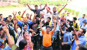 Students of the University Institute of Engineering and Technology celebrate after being unanimously elected department representatives at Panjab University on Friday.