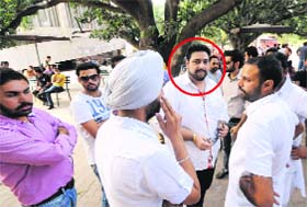 Rahul Bhattal (encircled), son of senior Congress leader Rajinder Kaur Bhattal, at Panjab University on Friday.