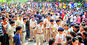 Students protest against the suspension of a second-year student of mechanical engineering on the university campus in Baddi on Friday.
