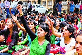 Students of the HPU Regional Centre protest against the police administration in front of the SP office in Dharamsala on Friday.