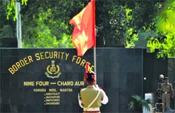 A BSF jawan proceeds for the flag meeting on Friday.