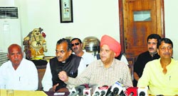 BJP legislator Ashok Khajuria addresses the media in Srinagar on Friday. Tribune Photo: Amin War