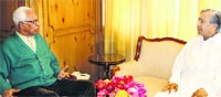 Governor NN Vohra interacts with CPM MLA MY Tarigami in Srinagar. A Tribune photograph