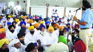 MLA Manpreet Singh Ayali addresses a meeting of party workers at Alamgir on Friday. 