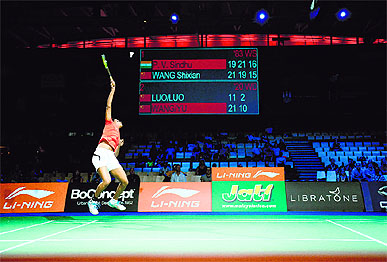 Sindhu plays a shot against Shixian Wang during the quarterfinals on Friday. 