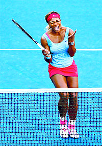 Serena Williams react as she play with her sister Venus Williams during their womens doubles match against Timea Babos of Hungary and Kristina Mladenovic of France on Day Four.