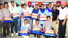Students in a jubilant mood with their awards during the concluding function of the three-day Inspire Awards Exhibition at Teachers Home in Bathinda on Saturday.