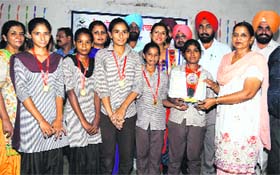 DEO Dr Amarjit Kaur Kotfatta honours the students.