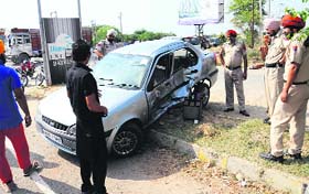 Mangled remains of a car that met with an accident on Goniana Road near Lake No. 3 in Bathinda on Saturday.