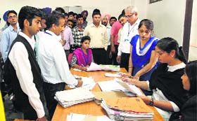 Final hearing: A Bench hearing a case during a Lok Adalat organised at the District Courts in Sector 43, Chandigarh, on Saturday
