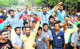 (Left to right) Abhishek Thakur (joint secretary), Neeraj Kharb (secretary) and Anil Sharma (president) after the PUSU declared its panel at Panjab University in Chandigarh on Saturday
