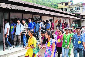 Students come out of their classes at Nurpur college on Saturday.