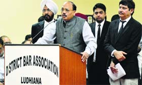 Justice Surya Kant addresses lawyers at the District Courts Complex in Ludhiana on Saturday.