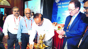 Union Health Minister Dr Harshwardhan lights the ceremonial lamp at the annual conference of the Neuro-trauma Society of India in Mussoorie on Friday.