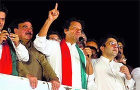 Imran Khan addresses his supporters during an anti-government protest in Islamabad. 