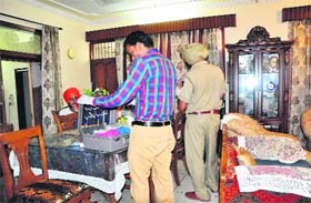 Police and forensic experts examine the spot where the firing took place in Sector 36, Chandigarh, on Sunday