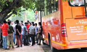 Students gear up for a trip organised by a student party in Chandigarh on Sunday
