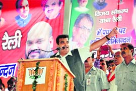 Union Minister Nitin Gadkari speaks during a rally, a part of Vijay Sankalp Yatra, in Jhajjar on Sunday.