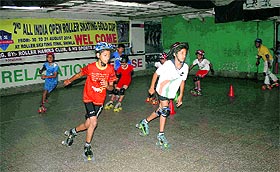 Participants in action during the 2nd All-India Open Roller Skating Gold Cup at the roller skating rink in Shimla on Sunday.